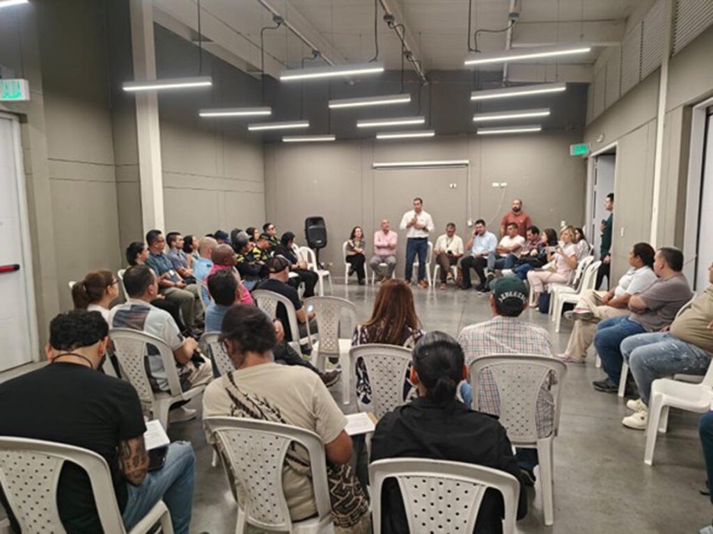 Encuentro con comerciantes