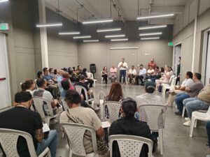 Encuentro con comerciantes